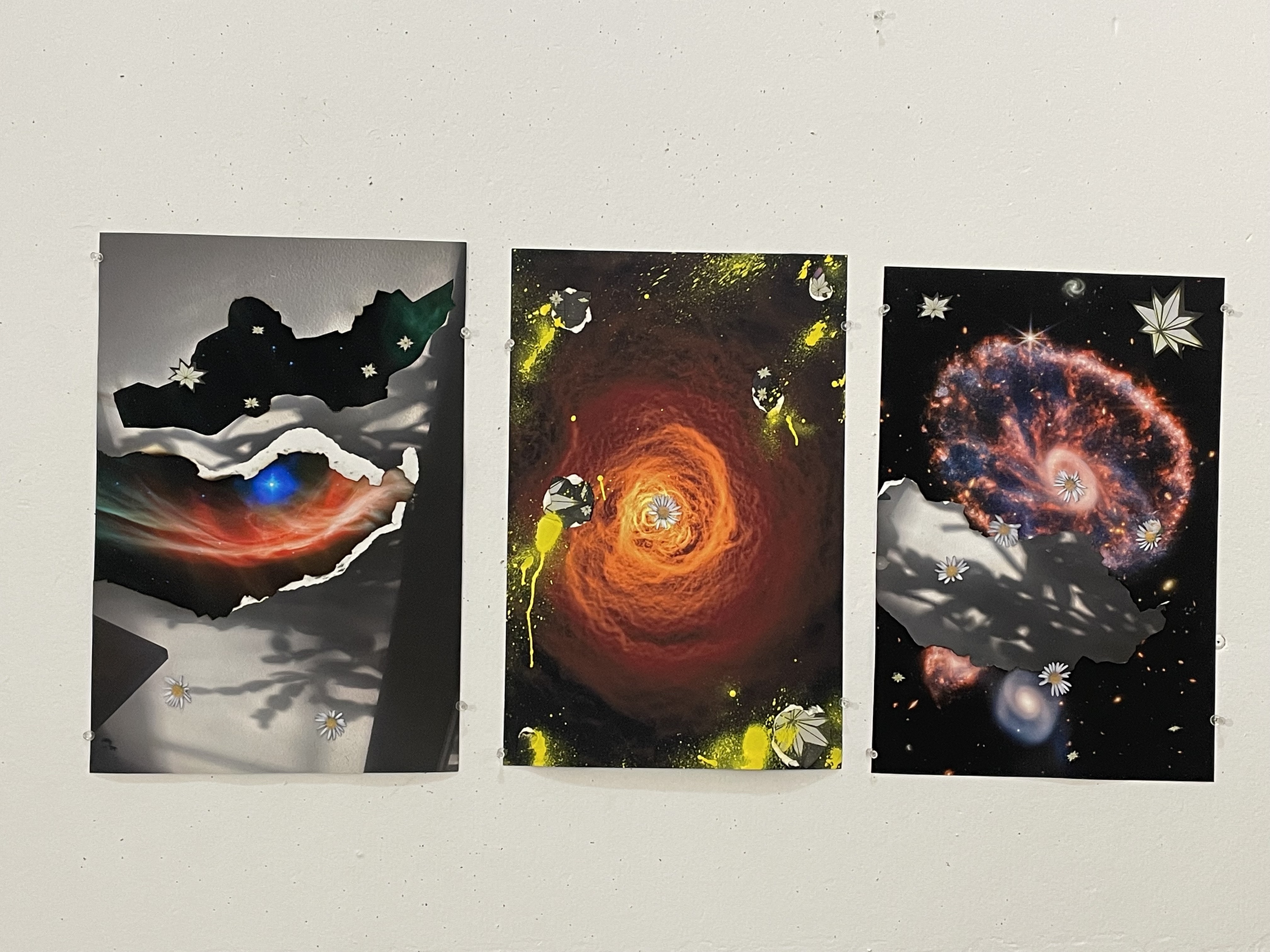 A set of three space themed mixed media pieces